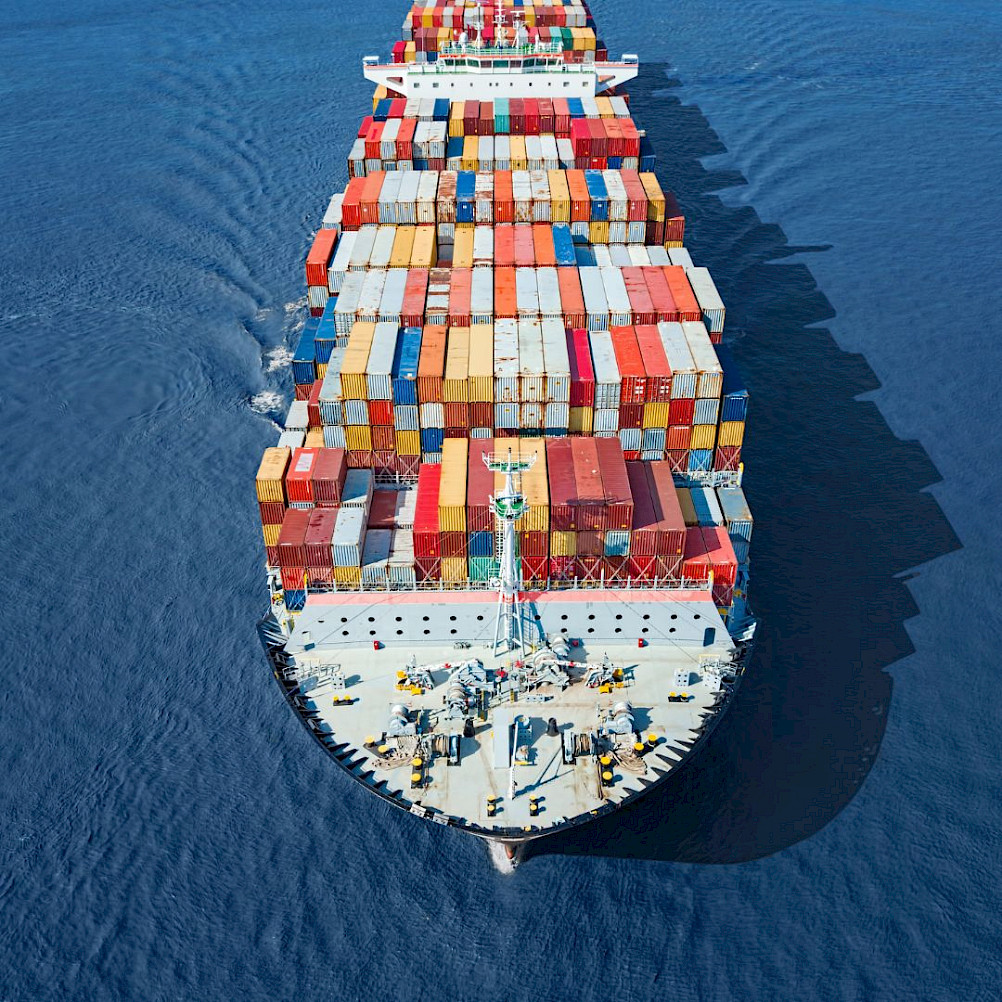 Marine fuel bunkering operation - TW International vessel delivering high-quality fuel to commercial ship