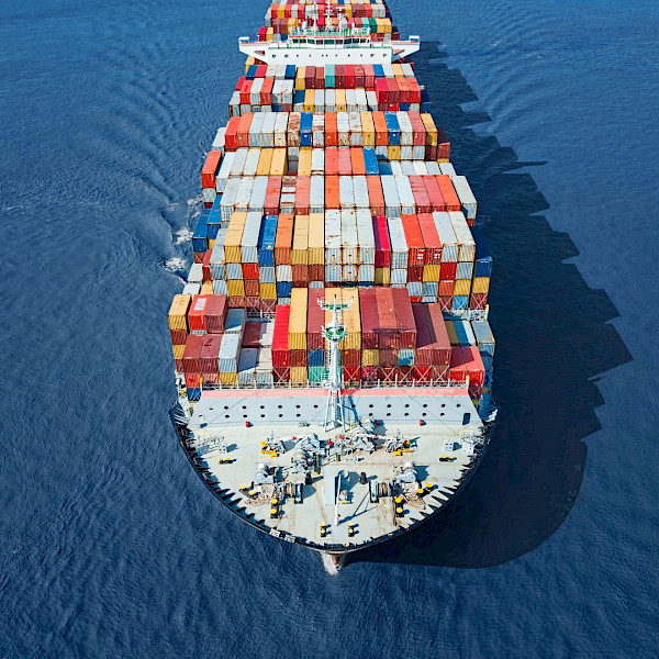 Marine fuel bunkering vessel delivering fuel to ship at Panama port